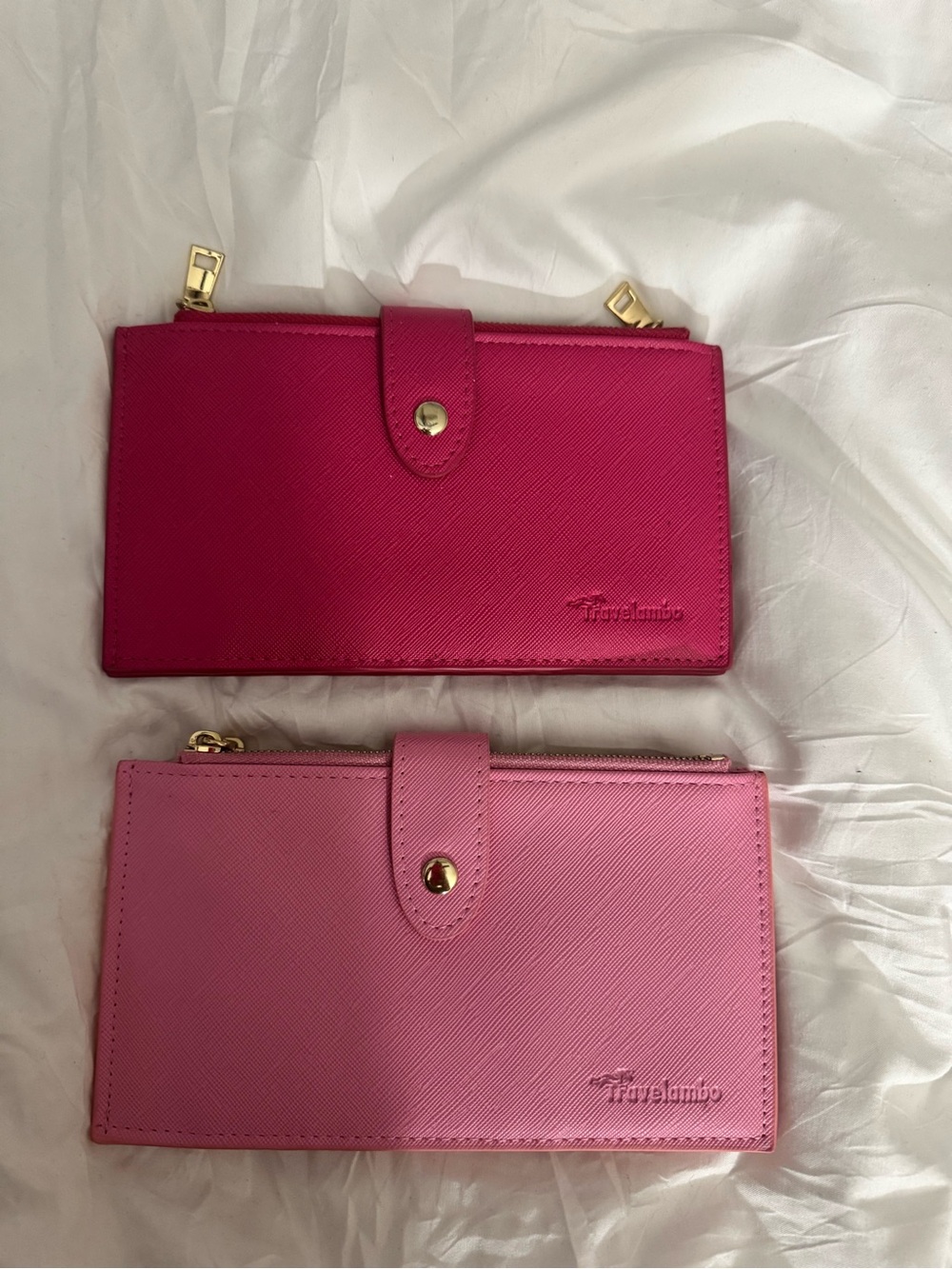 Pink and hot pink wallets